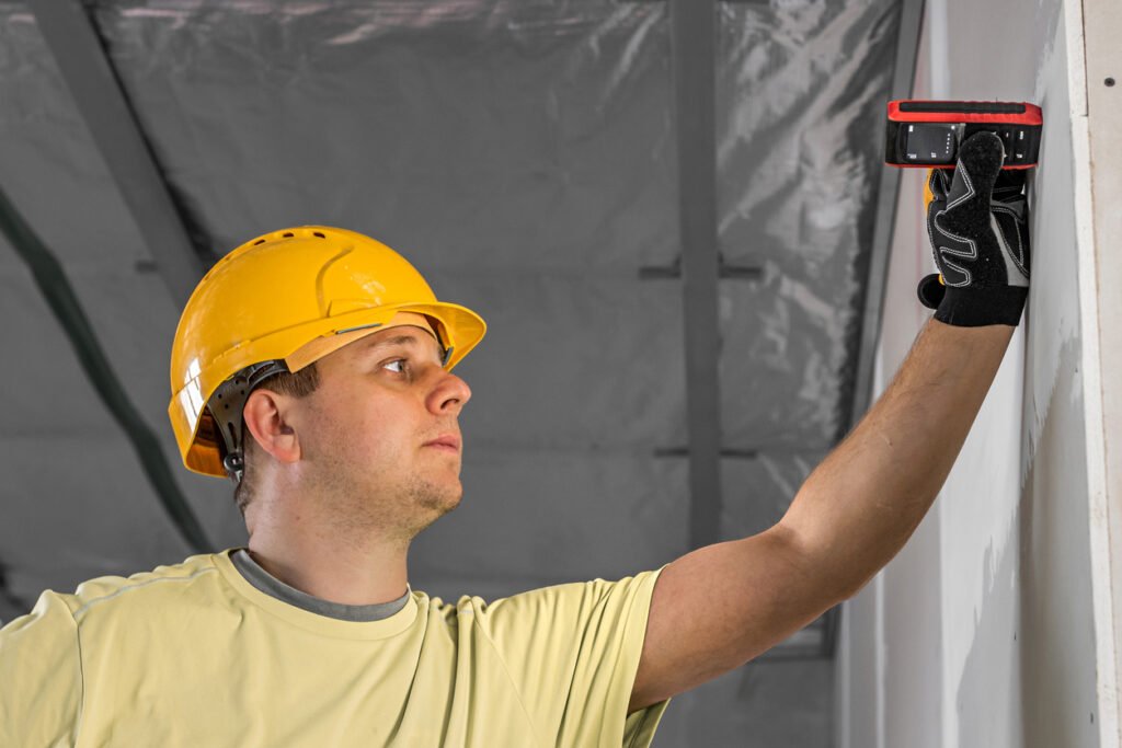Handyman using a laser distance